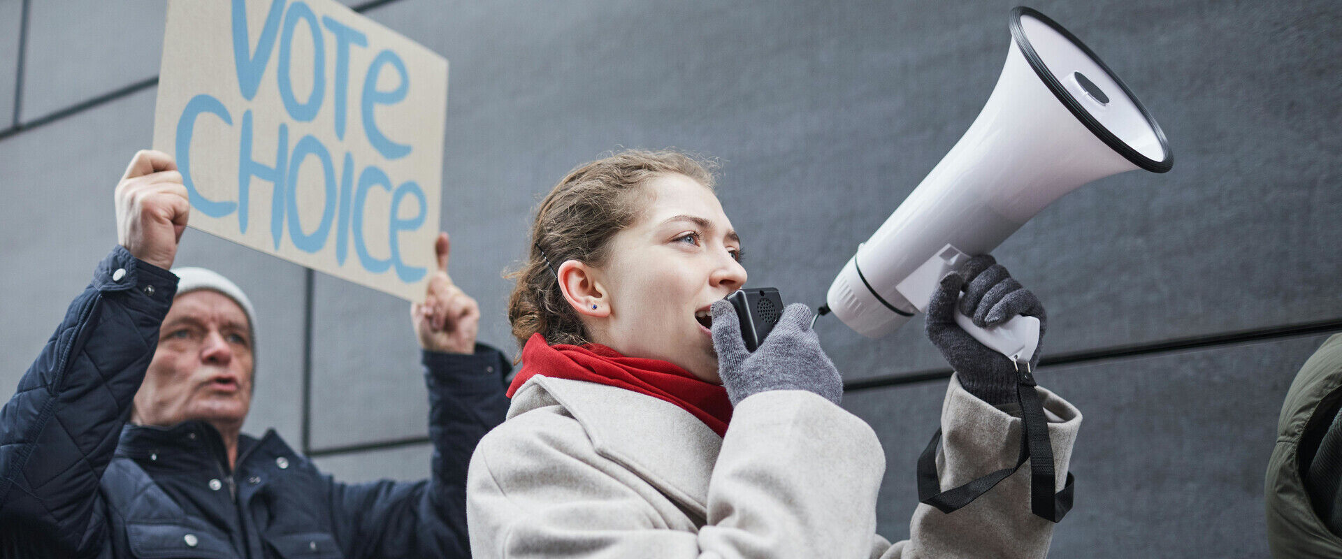 https://www.pexels.com/photo/a-woman-using-a-megaphone-7103049/